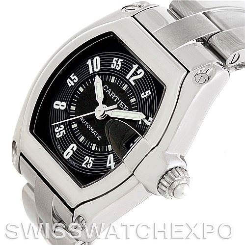 This image shows a close-up angle of the Cartier Roadster W62004V3 Men's Stainless Steel Black Dial W62004V3 Men's Stainless Steel Black Dial watch focusing on the bezel, dial, and a portion of the bracelet, including the crown.