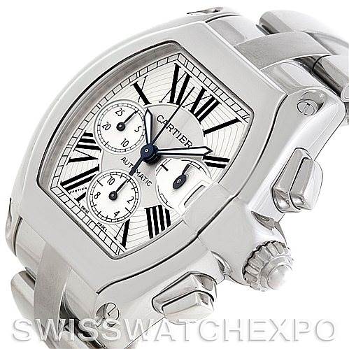 This image shows a Cartier Roadster W62019X6 Men's Stainless Steel Silver Dial W62019X6 Men's Stainless Steel Silver Dial watch at a three-quarter angle, highlighting the face, bezel, crown, and partial bracelet.