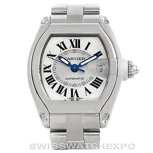 The image shows the front view of a Cartier Roadster W62025V3 Men's Stainless Steel Silver Dial W62025V3 Men's Stainless Steel Silver Dial watch, featuring its dial, blue hands, date window, and stainless steel bracelet.