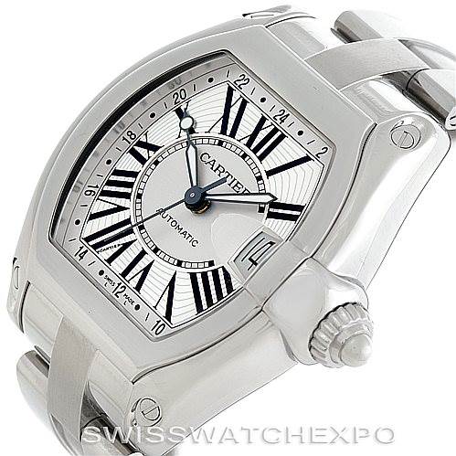 The image shows a close-up angle of the Cartier Roadster W62032X6 Men's Stainless Steel Silver Dial W62032X6 Men's Stainless Steel Silver Dial watch, highlighting the face, bezel, crown, and part of the bracelet.