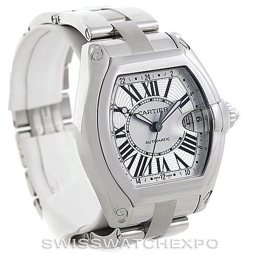 The image shows a Cartier Roadster W62032X6 Men's Stainless Steel Silver Dial W62032X6 Men's Stainless Steel Silver Dial watch angled from the left, displaying the watch face, bezel, crown, and part of the bracelet.