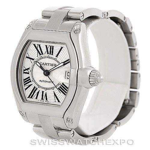 The image shows a Cartier Roadster W62025V3 Men's Stainless Steel Silver Dial W62025V3 Men's Stainless Steel Silver Dial watch from an angle displaying the face, crown, and bracelet prominently.