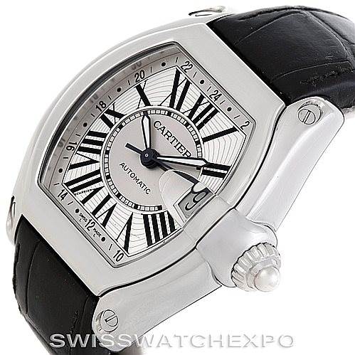 The image shows a Cartier Roadster W62032X6 Men's Stainless Steel Silver Dial W62032X6 Men's Stainless Steel Silver Dial watch at an angle showcasing the dial, case, crown, and part of the black leather strap.