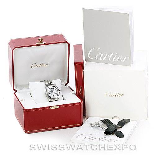 The image shows a Cartier Roadster W62025V3 Men's Stainless Steel Silver Dial W62025V3 Men's Stainless Steel Silver Dial watch in its box at a front angle, with accompanying accessories and packaging.
