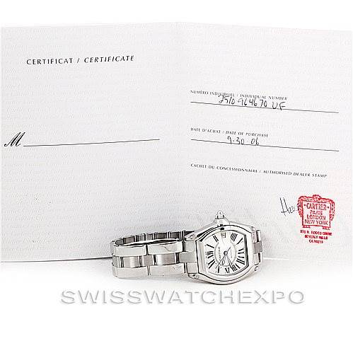 The image shows the Cartier Roadster W62025V3 Men's Stainless Steel Silver Dial W62025V3 Men's Stainless Steel Silver Dial watch displayed alongside its certificate.
