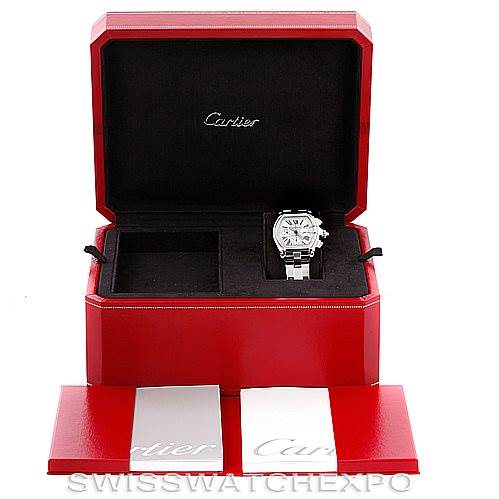 The image shows a Cartier Roadster W62019X6 Men's Stainless Steel Silver Dial W62019X6 Men's Stainless Steel Silver Dial model watch in its open red box, accompanied by booklets.