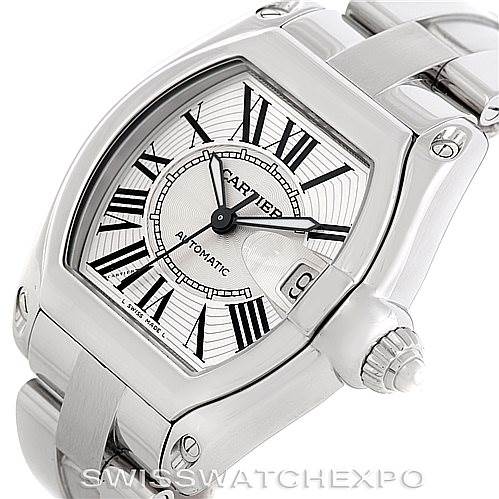 The image shows a close-up angle of the Cartier Roadster W62025V3 Men's Stainless Steel Silver Dial W62025V3 Men's Stainless Steel Silver Dial watch, highlighting the face, bezel, crown, and part of the bracelet.