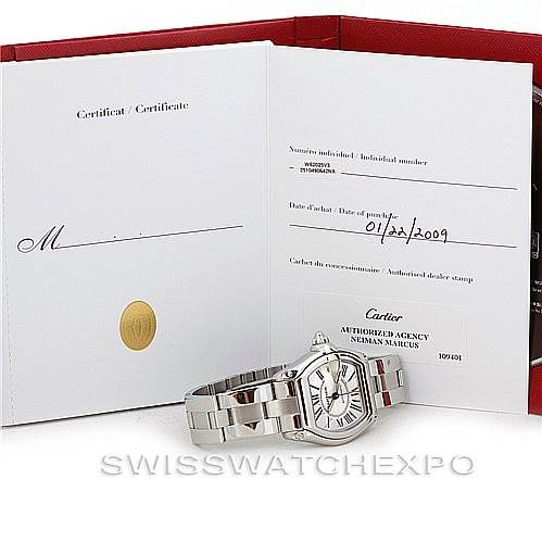 This image shows a Cartier Roadster W62025V3 Men's Stainless Steel Silver Dial W62025V3 Men's Stainless Steel Silver Dial watch alongside its certificate and documentation, all from a front angle.