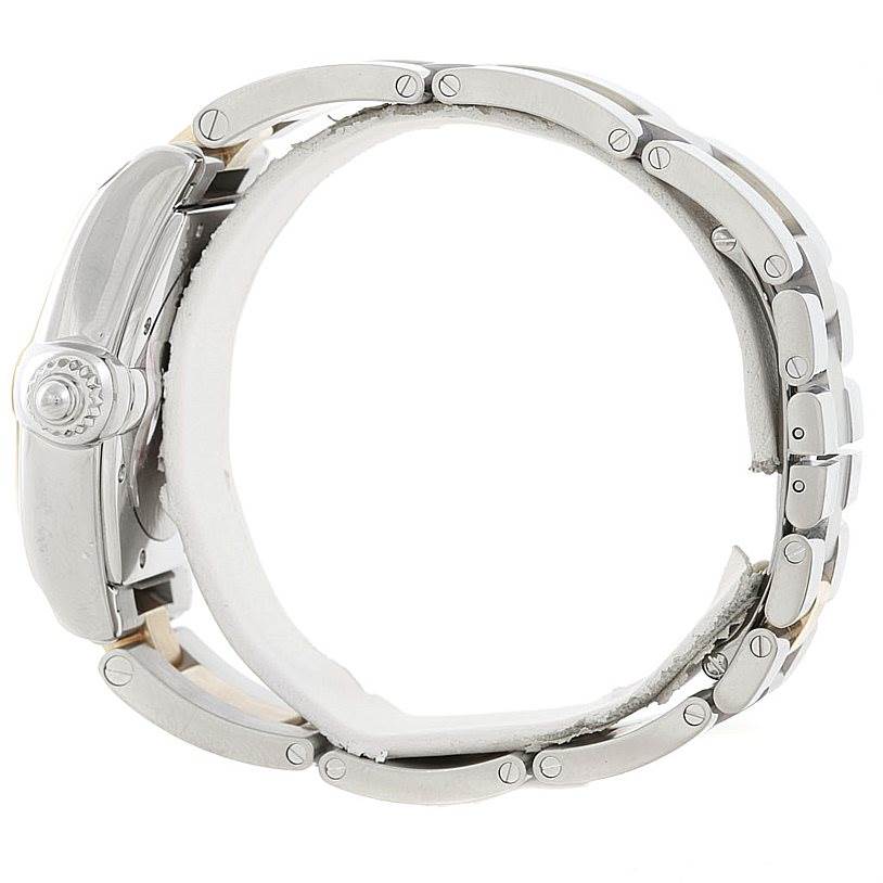 The image shows a side-angle view of a Cartier Roadster W62031Y4 Men's Steel and Gold (two tone) Silver Dial W62031Y4 Men's Steel and Gold (two tone) Silver Dial watch, highlighting the crown and metal bracelet.