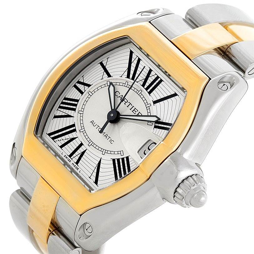 The Cartier Roadster W62031Y4 Men's Steel and Gold (two tone) Silver Dial W62031Y4 Men's Steel and Gold (two tone) Silver Dial watch is shown at an angle highlighting its face, crown, and part of the metal bracelet.