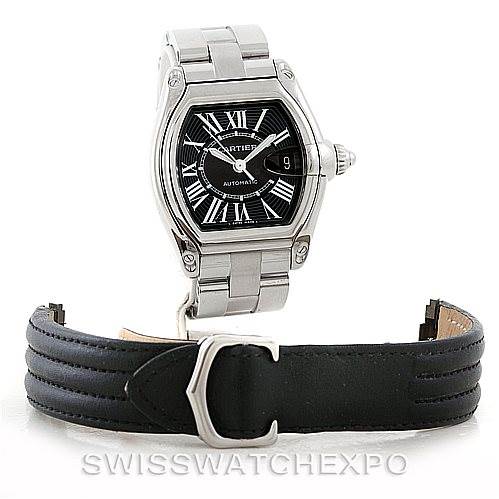 The image shows a Cartier Roadster W62041V3 Men's Stainless Steel Black Dial W62041V3 Men's Stainless Steel Black Dial watch from a front angle, including a metal bracelet and a separate black leather strap.
