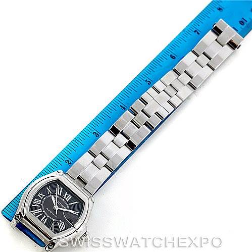 The Cartier Roadster W62041V3 Men's Stainless Steel Black Dial W62041V3 Men's Stainless Steel Black Dial model watch is displayed flat, showing the face and entire metal bracelet next to a ruler for scale.