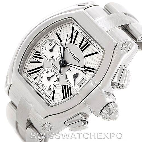 The image shows the Cartier Roadster W62019X6 Men's Stainless Steel Silver Dial W62019X6 Men's Stainless Steel Silver Dial watch from an oblique angle, highlighting its dial, crown, and part of the bracelet.