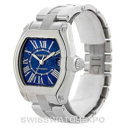 The image shows a Cartier Roadster W62048V3 Men's Stainless Steel Blue Dial W62048V3 Men's Stainless Steel Blue Dial watch from an oblique angle, highlighting the dial, case, crown, and bracelet.