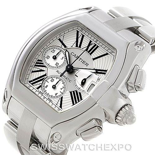 The image shows a Cartier Roadster W62019X6 Men's Stainless Steel Silver Dial W62019X6 Men's Stainless Steel Silver Dial watch at an angle highlighting its face, crown, and part of the stainless steel bracelet.