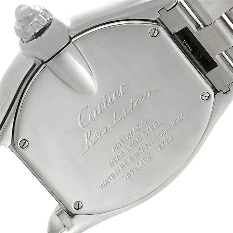 The image shows the back casing and part of the bracelet of a Cartier Roadster W62032X6 Men's Stainless Steel Silver Dial W62032X6 Men's Stainless Steel Silver Dial watch at an angled view.