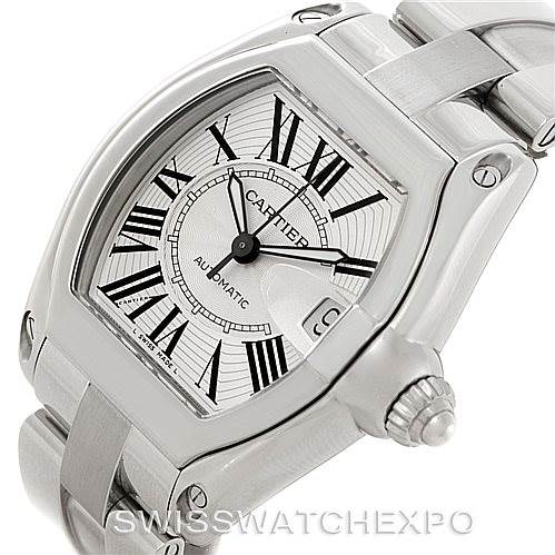 This image shows a close-up of the face, crown, and part of the bracelet of a Cartier Roadster W62025V3 Men's Stainless Steel Silver Dial W62025V3 Men's Stainless Steel Silver Dial watch.