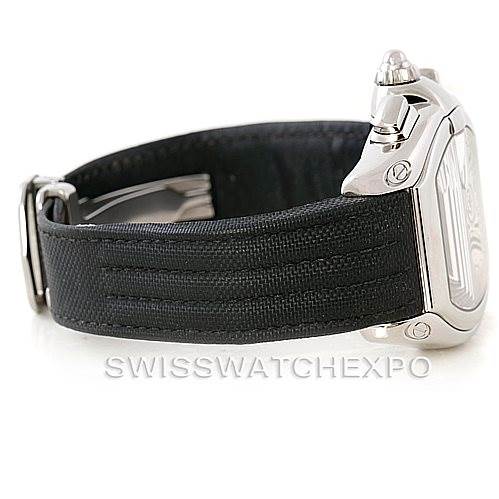 The image shows a Cartier Roadster W62019X6 Men's Stainless Steel Silver Dial W62019X6 Men's Stainless Steel Silver Dial watch from a side angle, highlighting the watch case, crown, and the black strap.