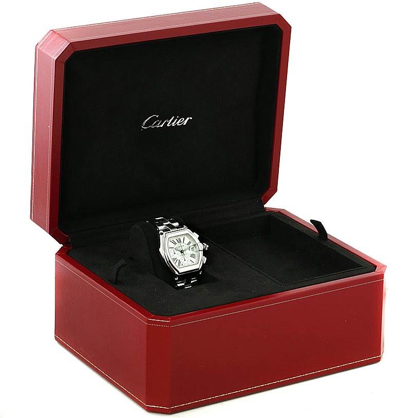 The Cartier Roadster W62019X6 Men
s Stainless Steel Silver Dial W62019X6 Men
s Stainless Steel Silver Dial model watch is shown from a front angle, displayed in an open red Cartier box.