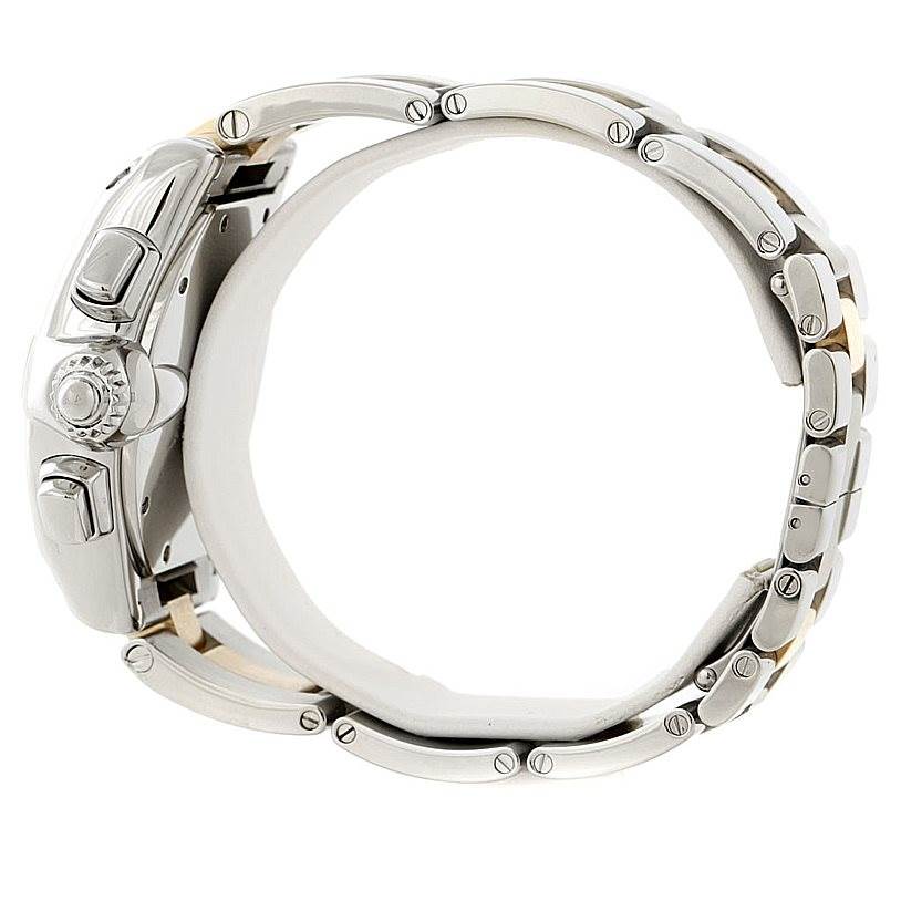 The image shows a side view of the Cartier Roadster W62027Z1 Men's Steel and Gold (two tone) Silver Dial W62027Z1 Men's Steel and Gold (two tone) Silver Dial watch, highlighting the crown, pushers, and bracelet links.