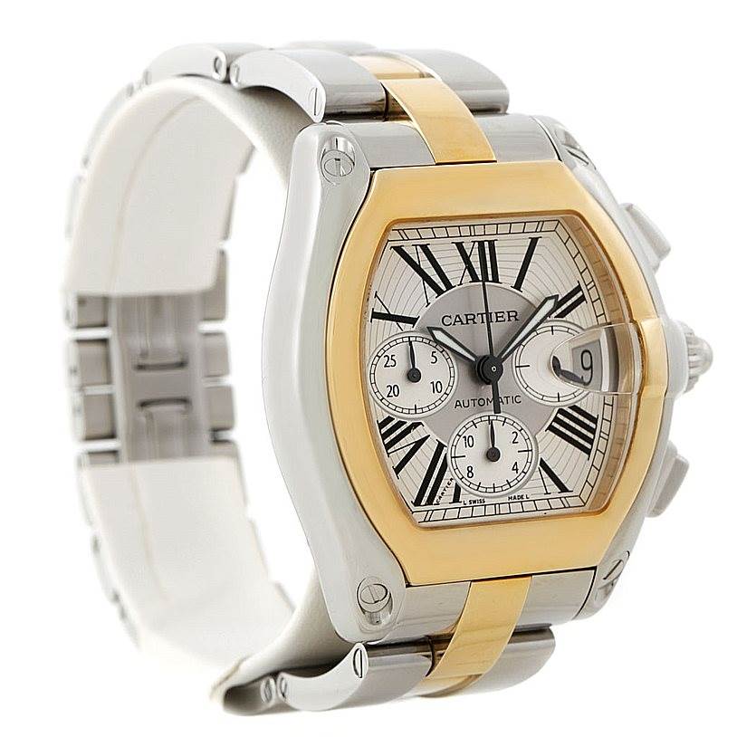 The Cartier Roadster W62027Z1 Men's Steel and Gold (two tone) Silver Dial W62027Z1 Men's Steel and Gold (two tone) Silver Dial watch is shown at a front side angle, highlighting the dial, bezel, and part of the bracelet.