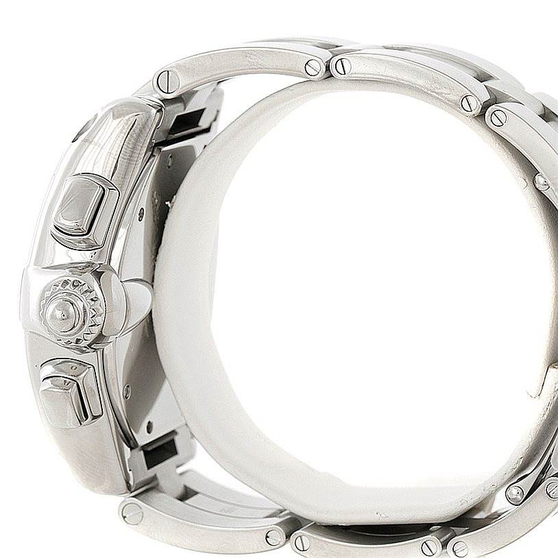 The image shows the side view of a Cartier Roadster W62019X6 Men
s Stainless Steel Silver Dial W62019X6 Men
s Stainless Steel Silver Dial watch, highlighting the crown, pushers, and part of the bracelet.