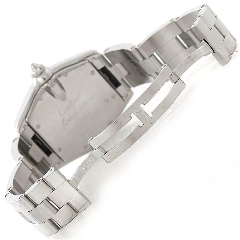 The image shows the underside of the Cartier Roadster W62000V3 Men's Stainless Steel Silver Dial W62000V3 Men's Stainless Steel Silver Dial watch with a focus on its stainless steel bracelet and clasp.