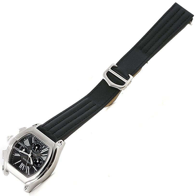 The Cartier Roadster W62020X6 Men's Stainless Steel Black Dial W62020X6 Men's Stainless Steel Black Dial watch is shown at an angle displaying the face, case, and full black rubber strap with buckle.