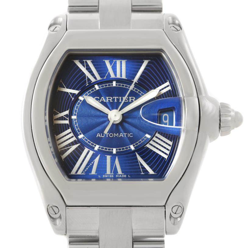 This image shows a frontal view of the Cartier Roadster W62048V3 Men's Stainless Steel Blue Dial W62048V3 Men's Stainless Steel Blue Dial watch, highlighting its blue dial, hands, and date window.