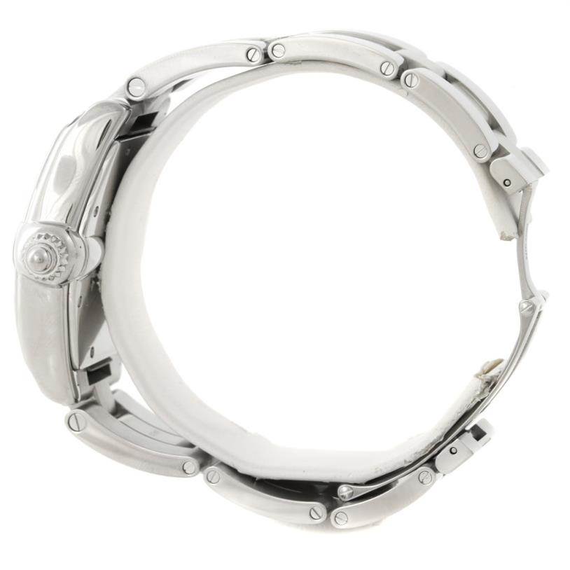 The image shows a side profile view of the Cartier Roadster W62048V3 Men's Stainless Steel Blue Dial W62048V3 Men's Stainless Steel Blue Dial watch, highlighting its crown and bracelet links.