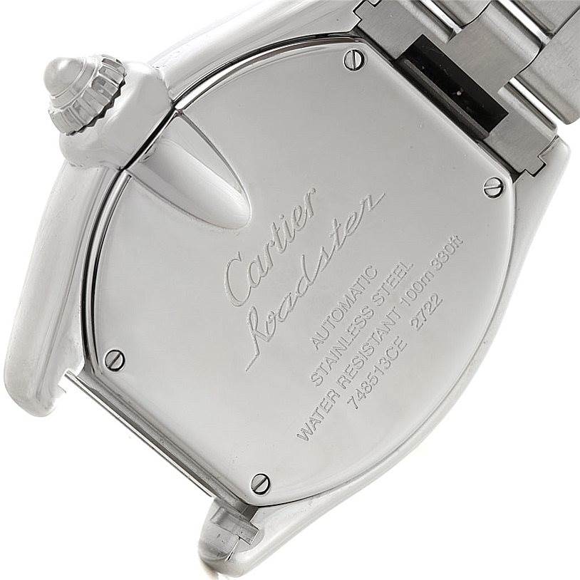 The image shows the back case and crown of the Cartier Roadster W62032X6 Men
s Stainless Steel Silver Dial W62032X6 Men
s Stainless Steel Silver Dial model watch from an angled close-up view.