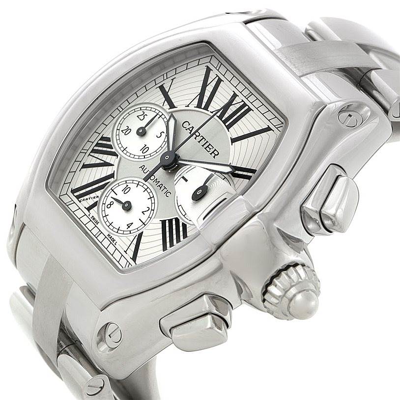 This image shows a close-up angle of the Cartier Roadster W62019X6 Men's Stainless Steel Silver Dial W62019X6 Men's Stainless Steel Silver Dial model watch, highlighting the crown, chronograph subdials, and part of the bracelet.