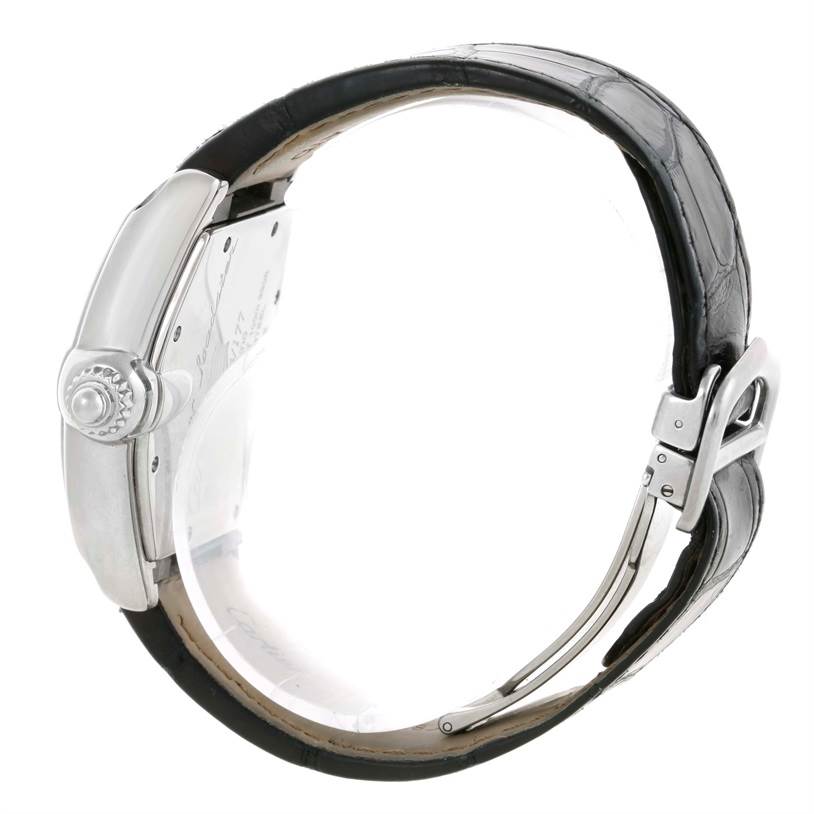 This image shows a side view of the Cartier Roadster W62025V3 Men's Stainless Steel Silver Dial W62025V3 Men's Stainless Steel Silver Dial watch, highlighting its case, crown, and leather strap with a clasp.