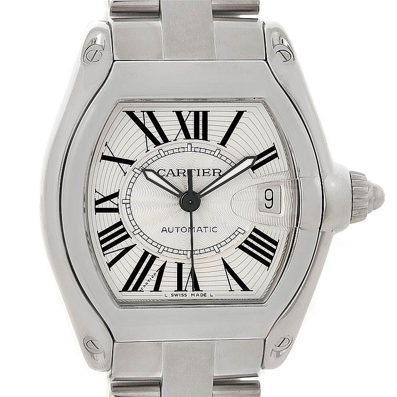The image shows a front view of the Cartier Roadster W62025V3 Men's Stainless Steel Silver Dial W62025V3 Men's Stainless Steel Silver Dial watch, highlighting the dial, crown, and parts of the bracelet.
