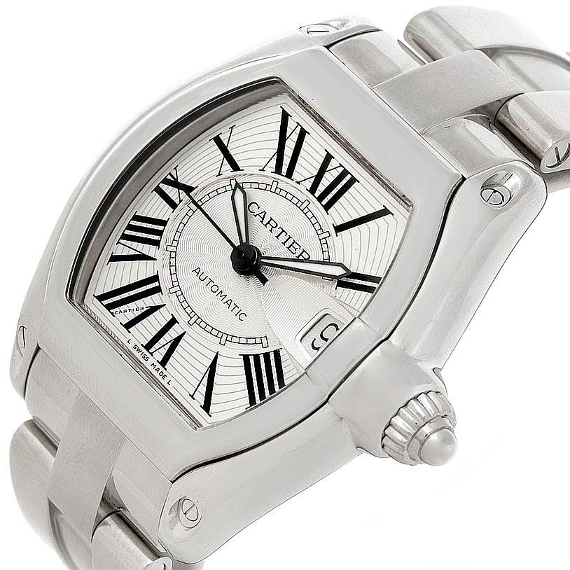This image shows a close-up angle of the Cartier Roadster W62025V3 Men's Stainless Steel Silver Dial W62025V3 Men's Stainless Steel Silver Dial watch, highlighting its dial, crown, and part of the bracelet.