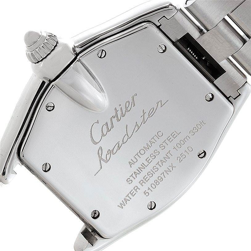 The image shows the back case and a portion of the bracelet of a Cartier Roadster W62041V3 Men's Stainless Steel Black Dial W62041V3 Men's Stainless Steel Black Dial watch, emphasizing its engravings and details.