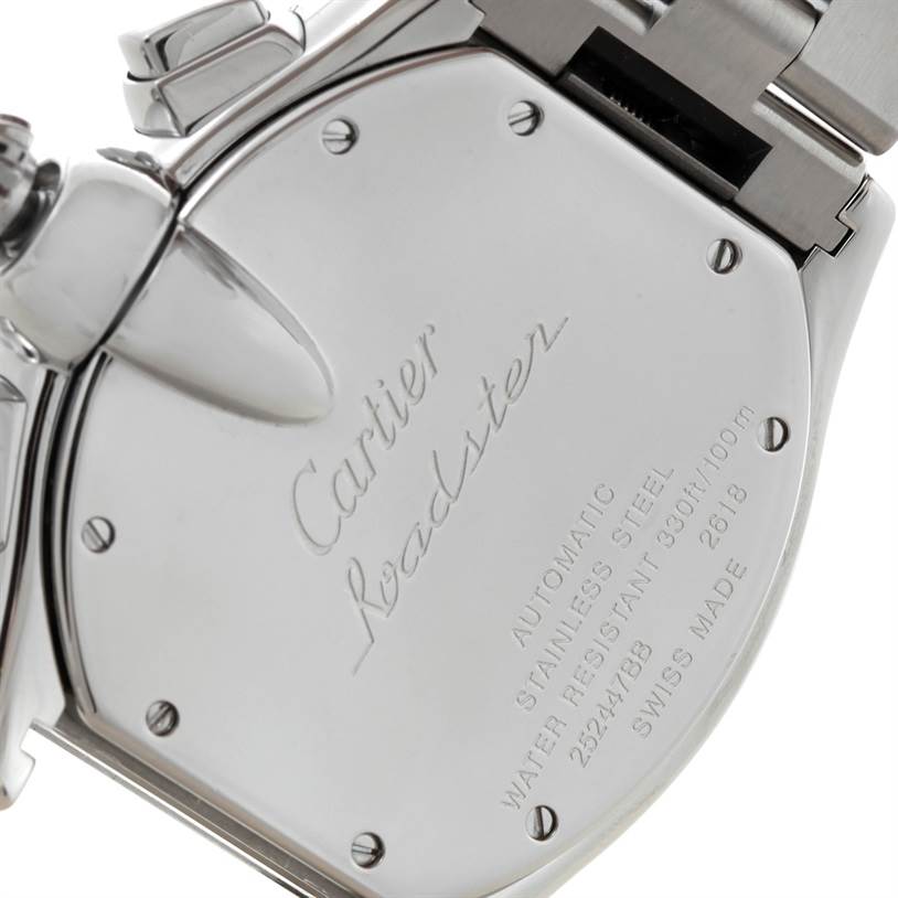 This image shows the back case of the Cartier Roadster W62020X6 Men's Stainless Steel Black Dial W62020X6 Men's Stainless Steel Black Dial watch, displaying the engraving and parts of the stainless steel bracelet.