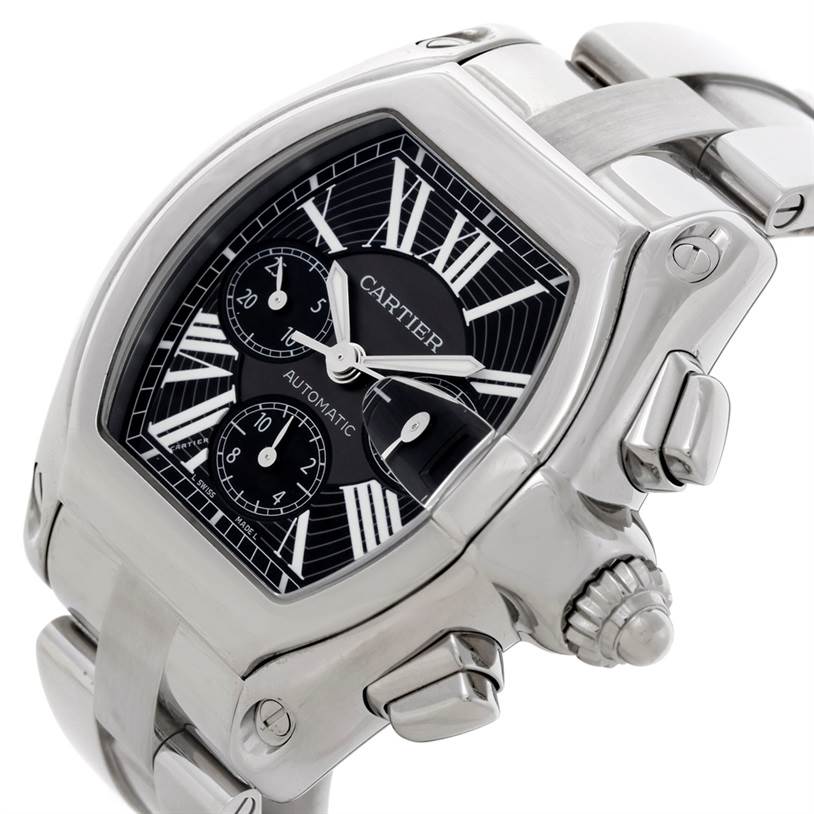 The image shows a Cartier Roadster W62020X6 Men's Stainless Steel Black Dial W62020X6 Men's Stainless Steel Black Dial watch from an angle displaying the face, bezel, crown, and part of the bracelet.
