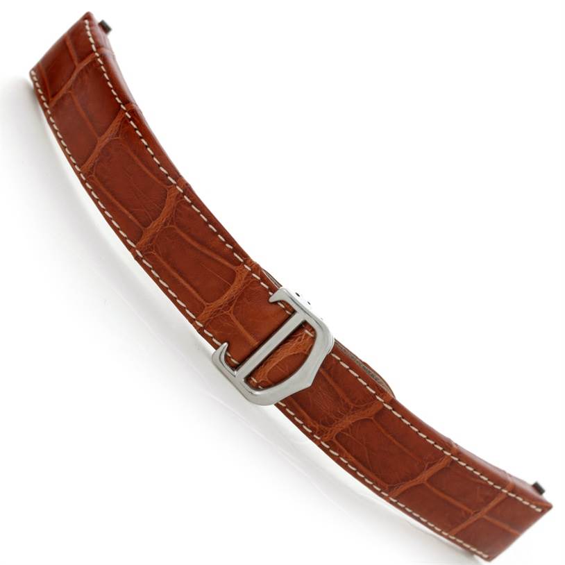 This image shows a brown leather strap with a metal clasp for the Cartier Roadster W62025V3 Men
s Stainless Steel Silver Dial W62025V3 Men
s Stainless Steel Silver Dial model.