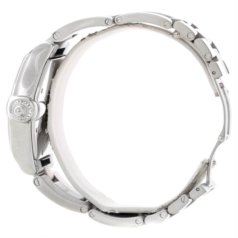 The image shows the side view of a Cartier Roadster W62025V3 Men
s Stainless Steel Silver Dial W62025V3 Men
s Stainless Steel Silver Dial watch, highlighting the crown and metal bracelet links.