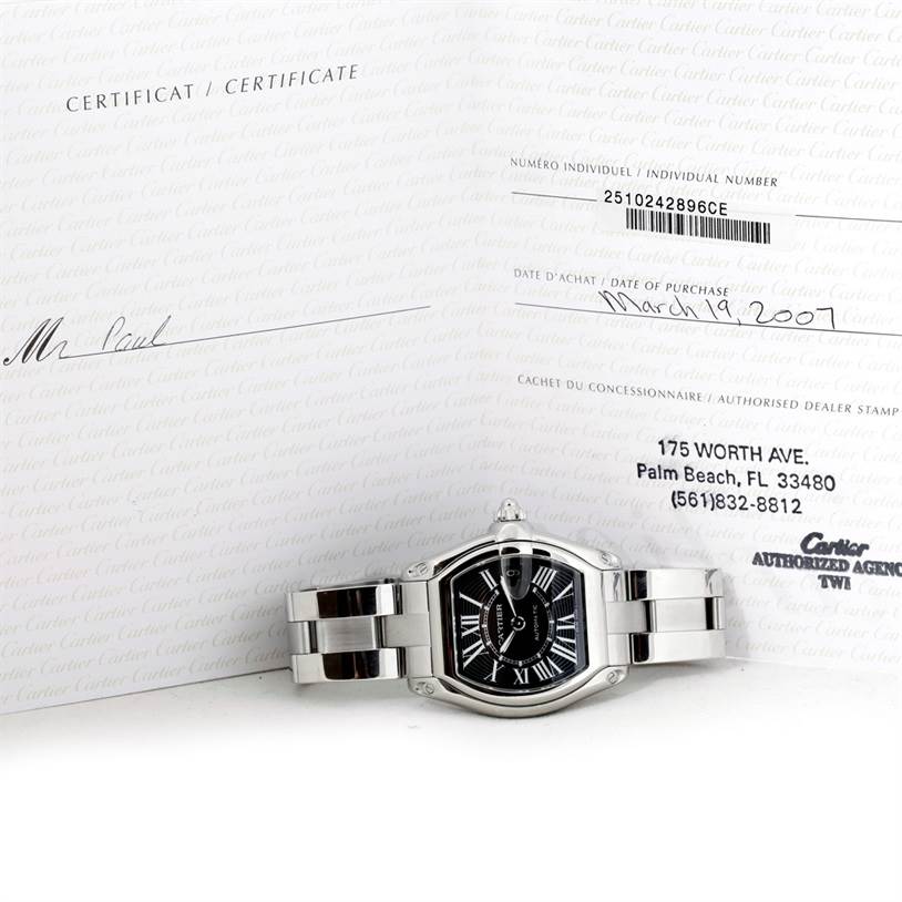 The Cartier Roadster W62041V3 Men's Stainless Steel Black Dial W62041V3 Men's Stainless Steel Black Dial watch is displayed flat, showing the face, bezel, and part of the bracelet, alongside its certificate.