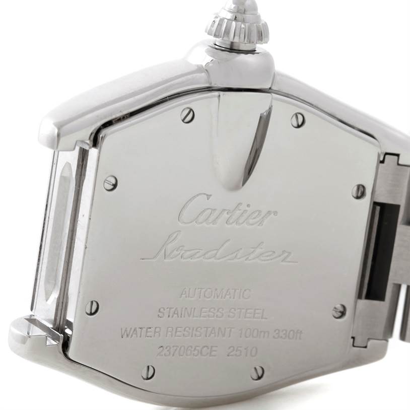 The image shows the back casing and crown of a Cartier Roadster W62025V3 Men
s Stainless Steel Silver Dial W62025V3 Men
s Stainless Steel Silver Dial watch, highlighting the engravings and markings.