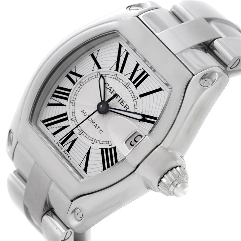 The Cartier Roadster W62025V3 Men
s Stainless Steel Silver Dial W62025V3 Men
s Stainless Steel Silver Dial watch is shown from a high angle showcasing the dial, crown, and part of the bracelet.
