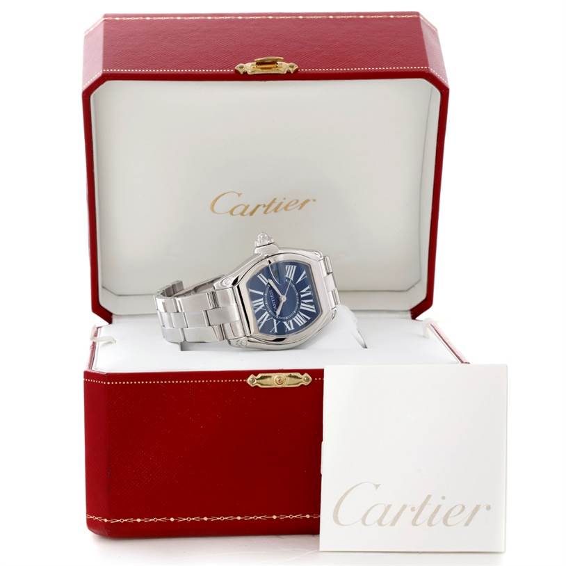The Cartier Roadster W6206012 Men's Stainless Steel Blue Dial W6206012 Men's Stainless Steel Blue Dial watch is displayed in an open red Cartier box, showing its back and side profile with a steel bracelet.