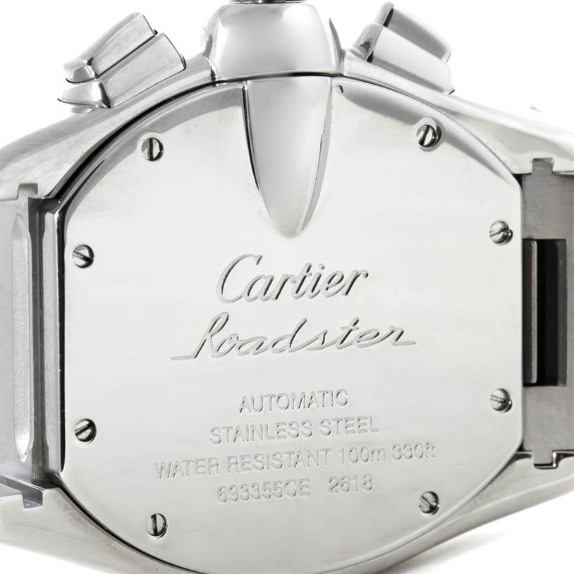 This image shows the back case of the Cartier Roadster W62019X6 Men's Stainless Steel Silver Dial W62019X6 Men's Stainless Steel Silver Dial watch in a close-up angle, highlighting its engravings and stainless steel material.