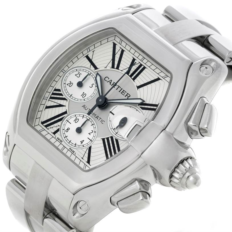 The image shows a Cartier Roadster W62019X6 Men's Stainless Steel Silver Dial W62019X6 Men's Stainless Steel Silver Dial watch at an angled view, highlighting the dial, crown, and metal bracelet.