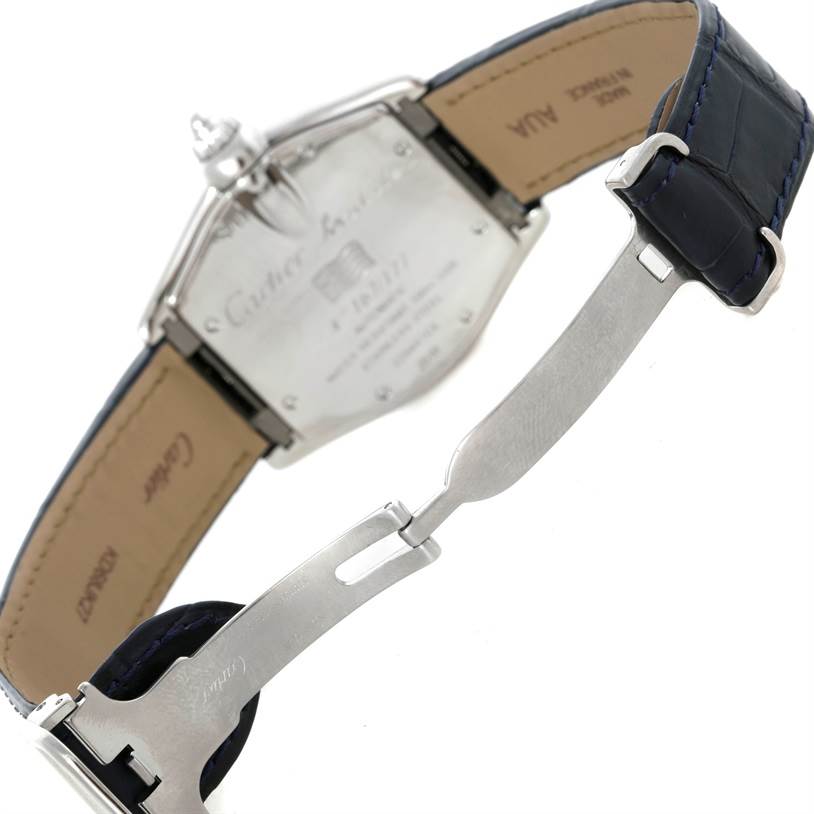 The image shows the back case and open clasp of a Cartier Roadster W62025V3 Men's Stainless Steel Silver Dial W62025V3 Men's Stainless Steel Silver Dial watch, highlighting the leather strap and deployment buckle.