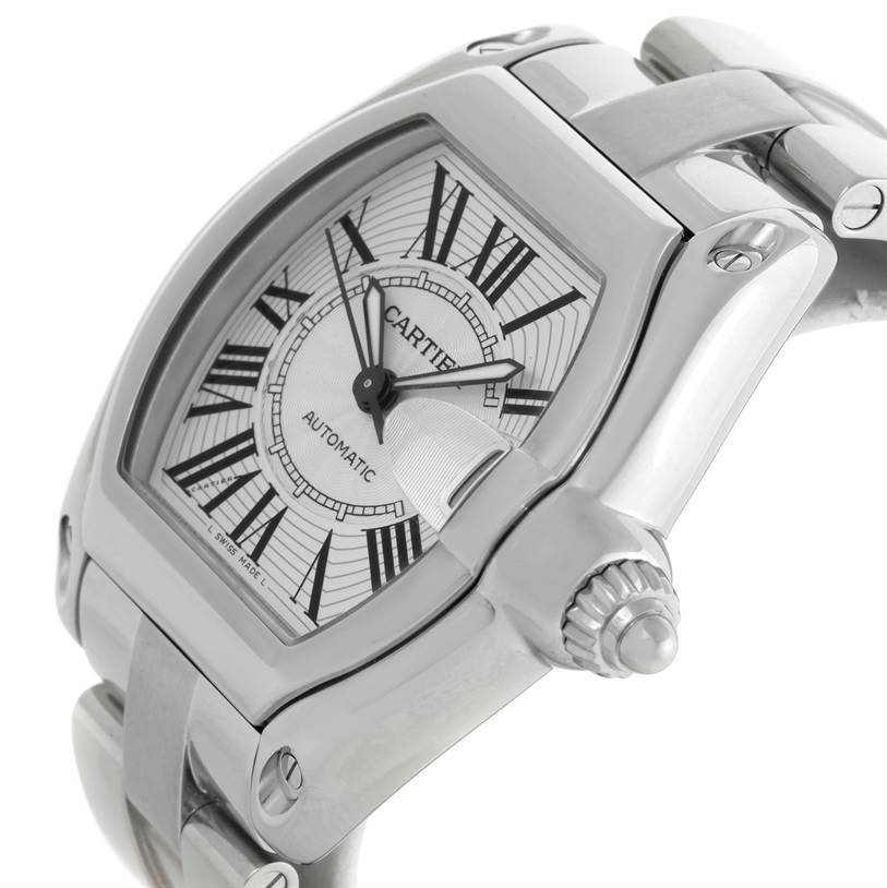 The image shows a close-up of the Cartier Roadster W62025V3 Men's Stainless Steel Silver Dial W62025V3 Men's Stainless Steel Silver Dial watch, highlighting the dial, crown, and part of the bracelet.