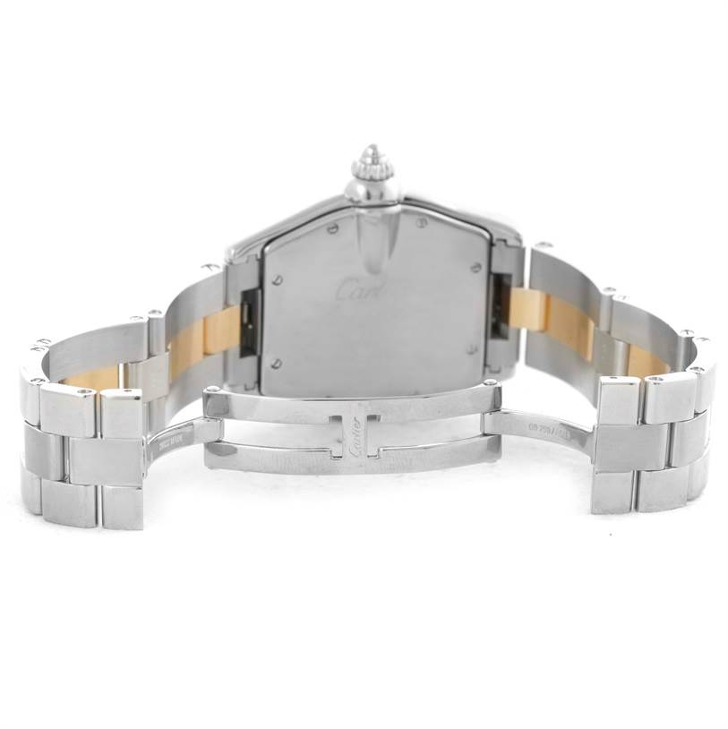 The image shows the back case and open stainless steel bracelet of a Cartier Roadster W62031Y4 Men's Steel and Gold (two tone) Silver Dial W62031Y4 Men's Steel and Gold (two tone) Silver Dial watch.