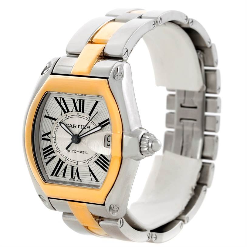 This image shows a Cartier Roadster W62031Y4 Men's Steel and Gold (two tone) Silver Dial W62031Y4 Men's Steel and Gold (two tone) Silver Dial watch at a three-quarter angle, highlighting its face, crown, and two-tone bracelet.